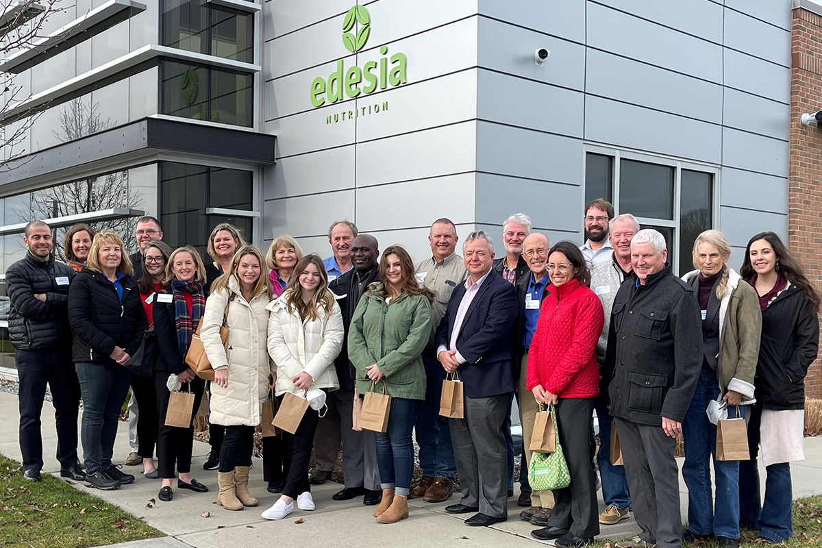 A group photo of U.S. Soy farmer-leaders and soy supply chain representatives in front of Edesia.